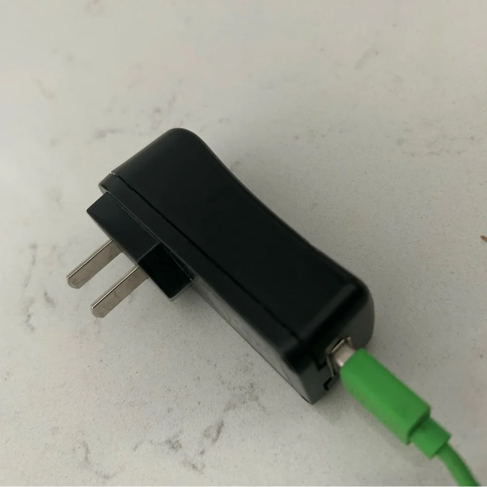 GOOGLE Gray Fabric Smart Speaker with Bright Green Cable